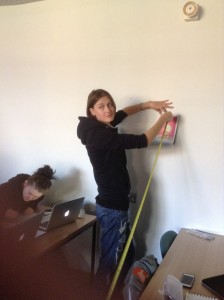 Typography student Polina setting up to measure ex/inclusivity in cover design.