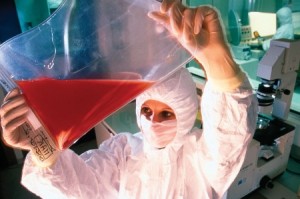 female-scientist-examines-blood-sample-in-ba_450