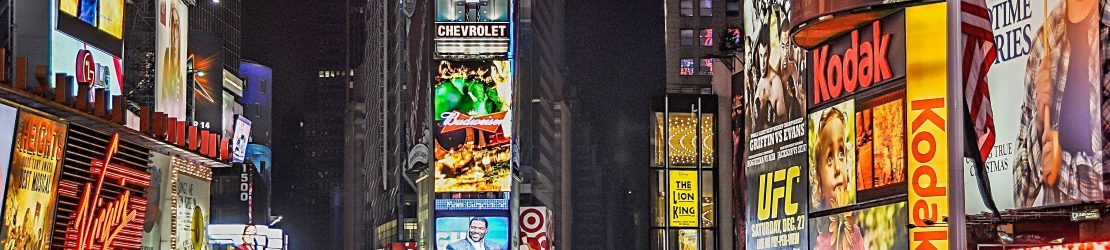 City illuminated by adverts