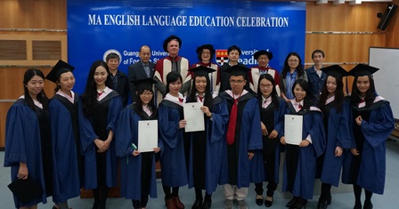 First row: ten of the 19 graduates. Second row: Dr Wang Yunfeng, Deputy director of International Office (who is in charge  of the Joint programme with Reading), Professor Wen Binli (Dean of the Faculty of English Language and Culture), Professor Andy Goodwyn, Head of the IoE, Professor Jeanine Treffers-Daller of the IoE,  Dr Zhao Chen (Deputy Director of the Graduate School and teaching on the award), Dr Daguo Li (Reading, ISLI and IoE), Ms Zhang Xin (Vice Dean of the Faculty of English Language and Culture, in charge of foreign affairs), Mr Zheng Changqing (administrator in charge of the programme, GDUFS)   