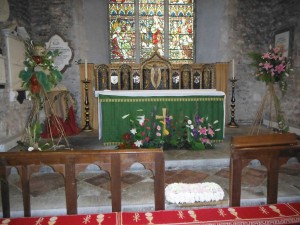 Flower displays at the altar