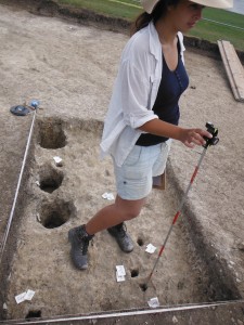 Nicola takes levels (heights above sea level) for the tiny stake holes she discovered in the South East quadrant of SFB 7