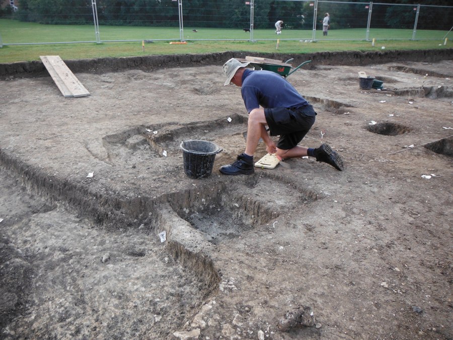 Peter excavates the north east corner of Timber Building 1, which has the largest door post pits.