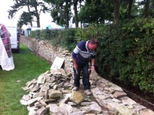 The Cotswolds dry stone wall at Newbury Showground grows by just a few metres every year.