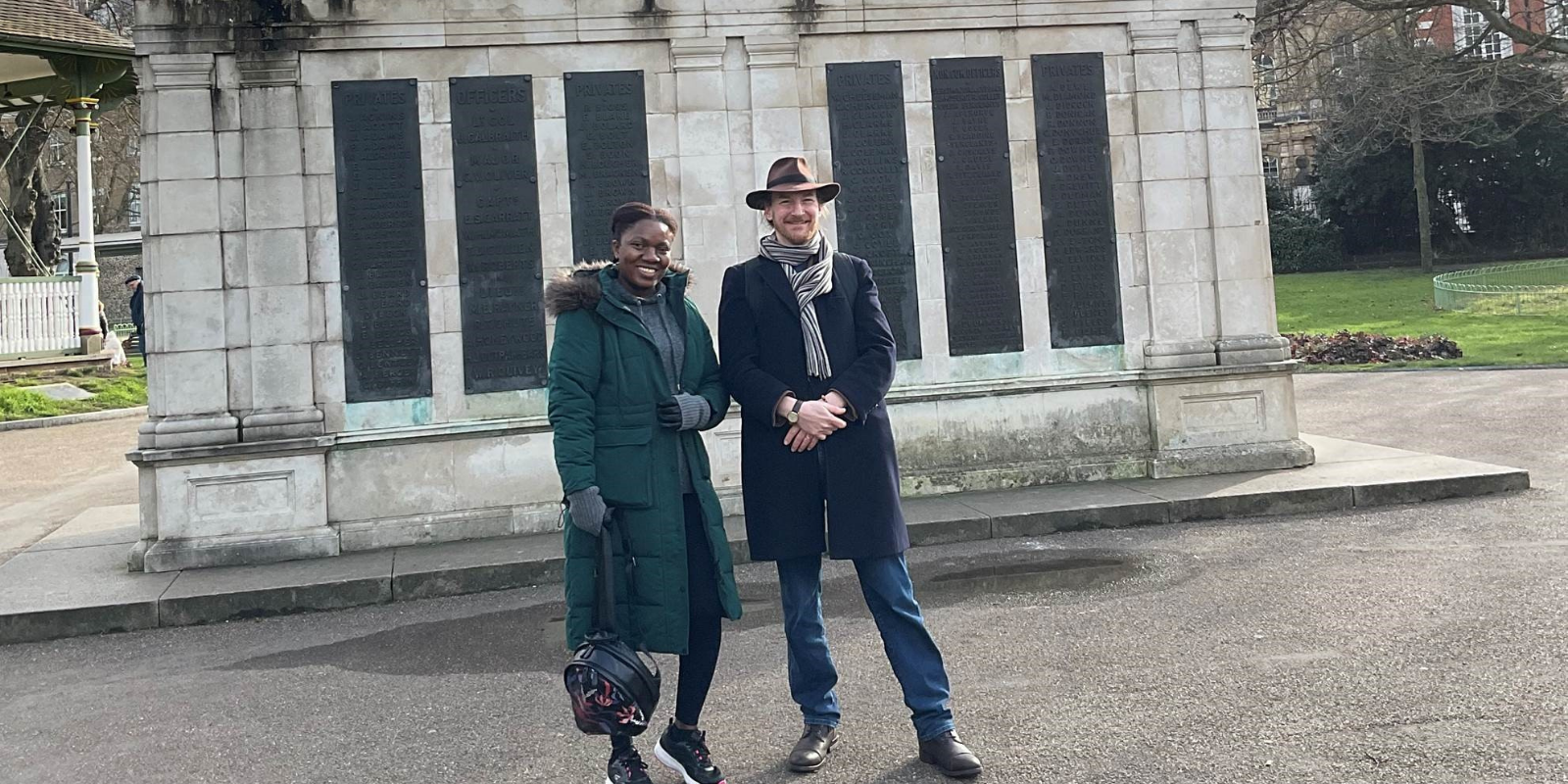Oluwatoyin Bayagbon and Mark Laynesmith standing infront of a statue in Forbury Gardens.