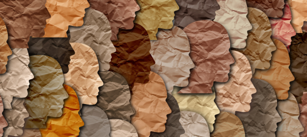 a paper collage of different black skin tones